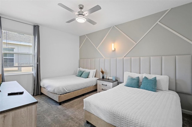 bedroom featuring ceiling fan and carpet floors