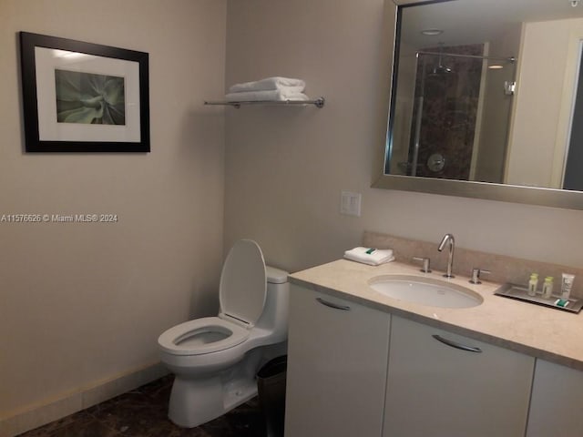 bathroom with walk in shower, toilet, tile floors, and vanity