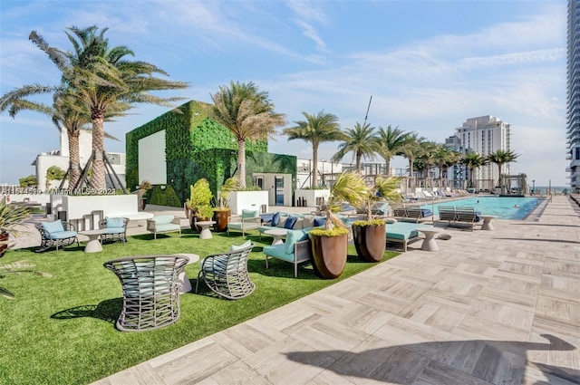 view of terrace with a community pool