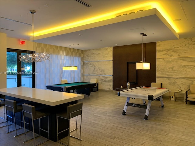 recreation room with french doors, tile walls, and billiards