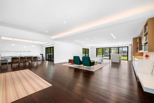 living room featuring dark wood-type flooring