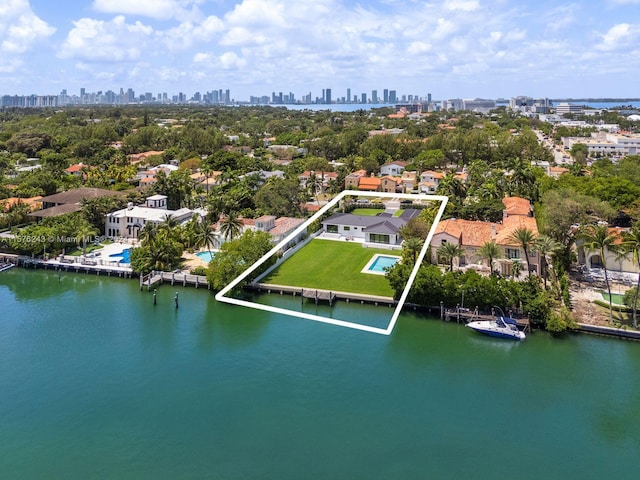 aerial view with a view of city and a water view