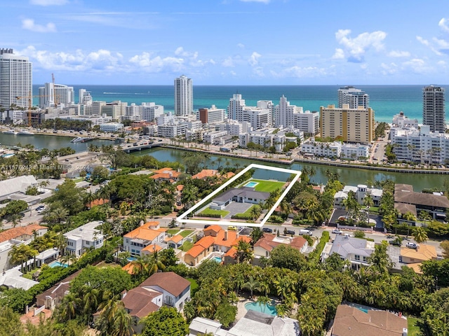 bird's eye view with a water view and a view of city