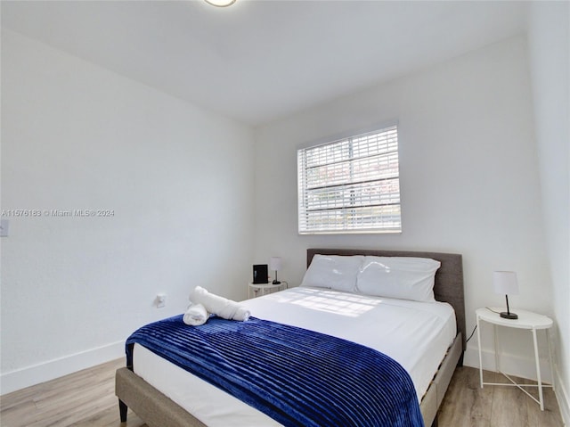 bedroom featuring light hardwood / wood-style flooring