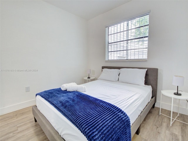 bedroom featuring light hardwood / wood-style floors