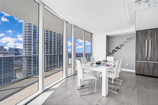 dining area featuring expansive windows