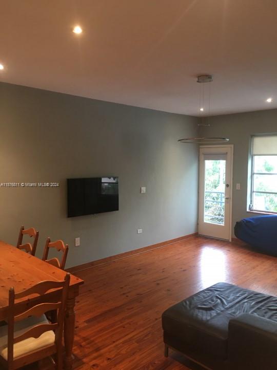 living room with hardwood / wood-style floors