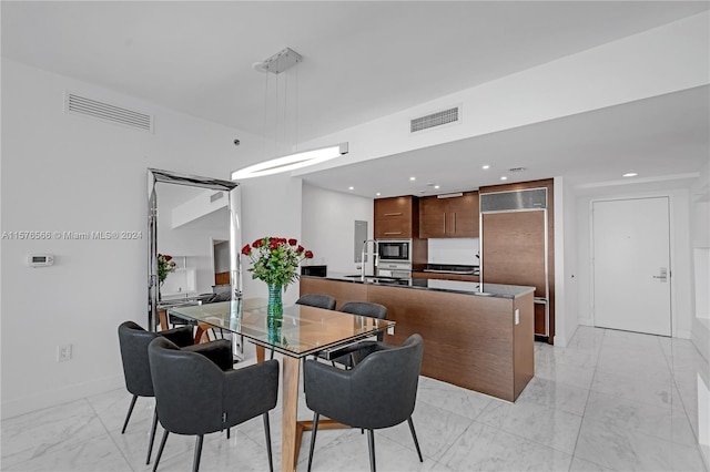 view of tiled dining space