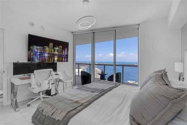 tiled bedroom with access to exterior, a wall of windows, and a water view