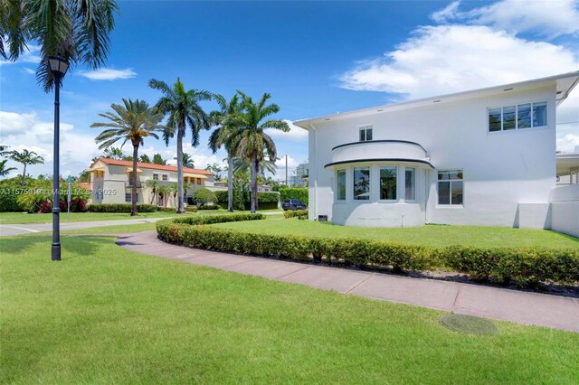 exterior space with a front yard