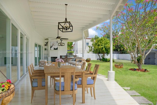 view of patio / terrace featuring ceiling fan