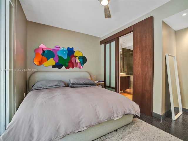 bedroom featuring ensuite bathroom and ceiling fan