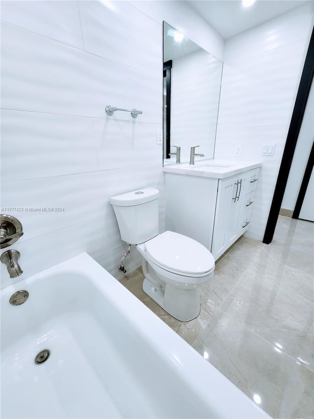 bathroom featuring toilet, tile floors, and vanity