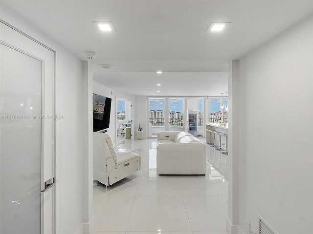 living room with light tile patterned floors