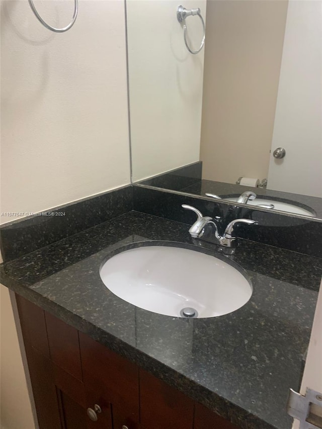 bathroom featuring large vanity