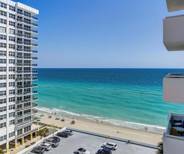 property view of water featuring a beach view