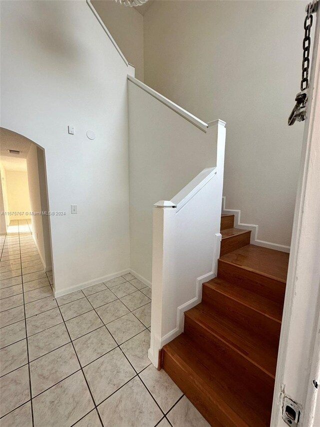 staircase featuring light hardwood / wood-style flooring