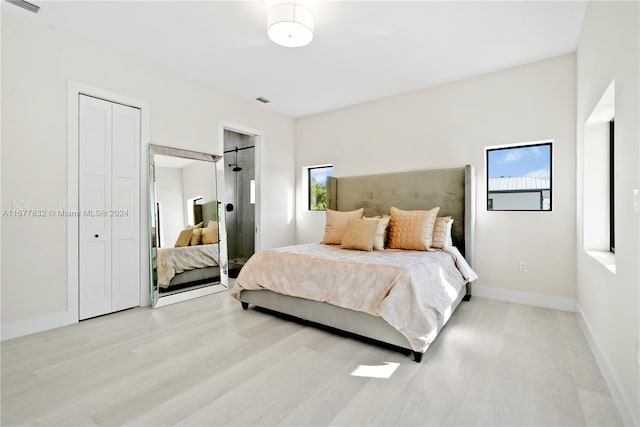 bedroom featuring light wood-type flooring