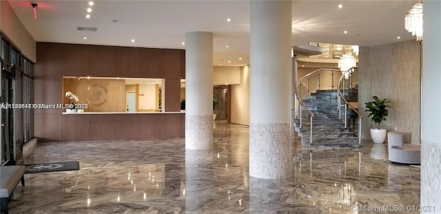 reception area featuring decorative columns