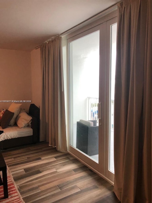 bedroom featuring hardwood / wood-style flooring