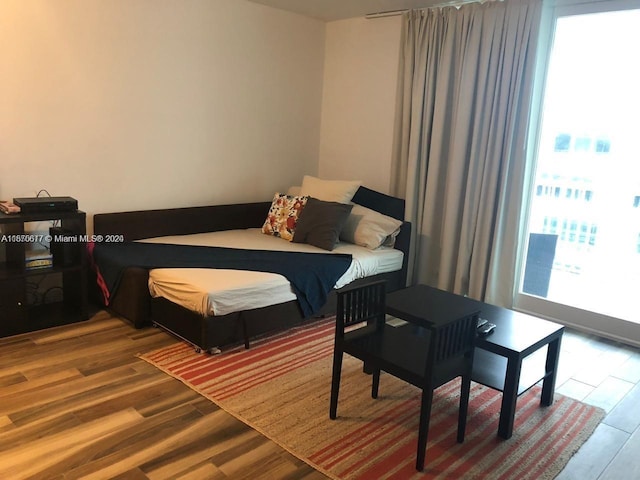 bedroom featuring hardwood / wood-style flooring