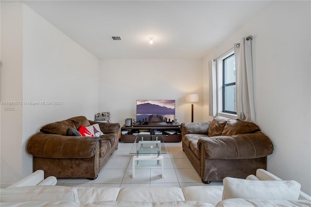 living room featuring light tile patterned flooring