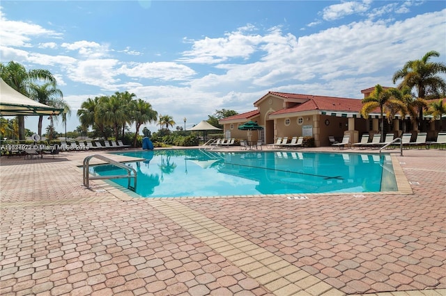 view of swimming pool featuring a patio