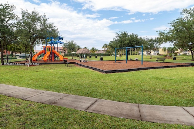 view of playground with a yard