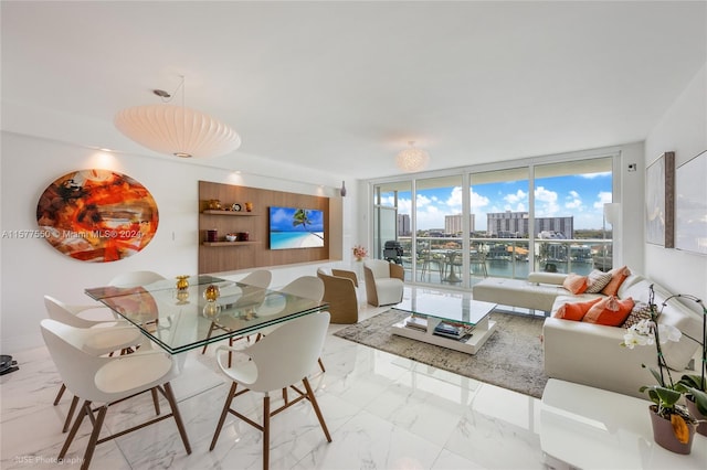 tiled dining area with a wall of windows