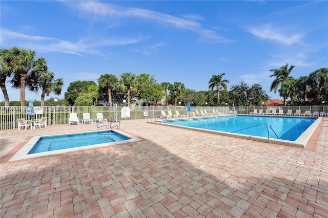 view of swimming pool featuring a patio