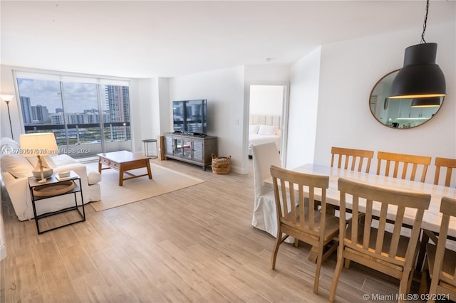 dining room featuring light hardwood / wood-style floors