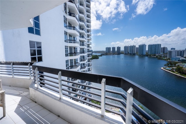 balcony featuring a water view