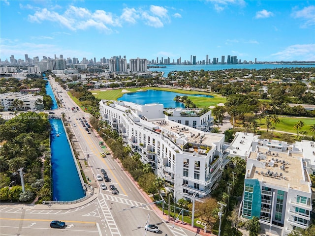 bird's eye view with a water view