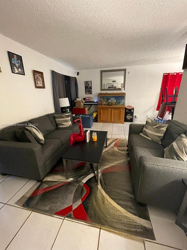 tiled living room with a textured ceiling