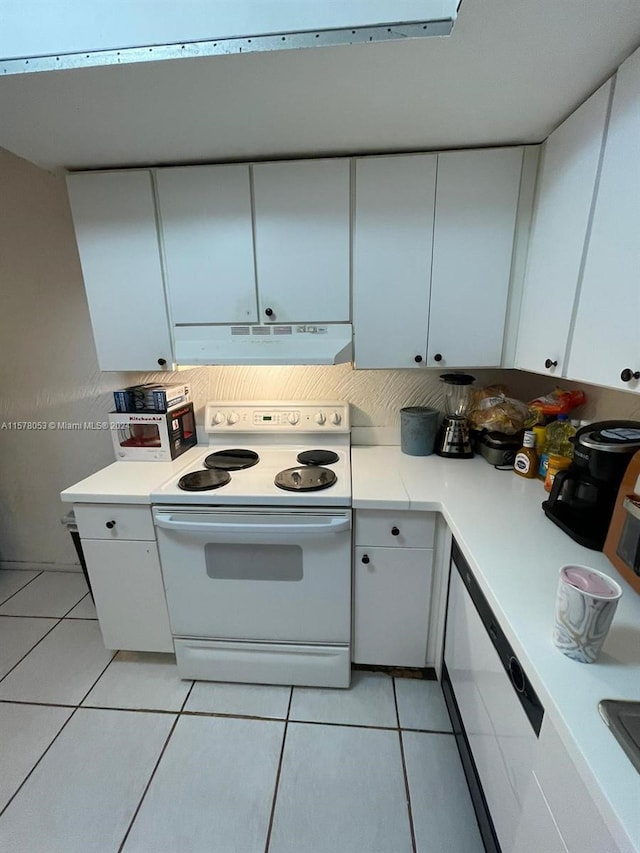 kitchen with white range with electric cooktop, white cabinets, and light tile floors