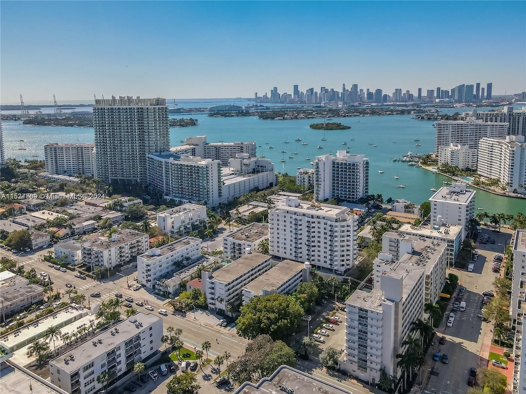 drone / aerial view featuring a water view