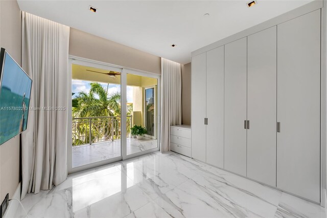 bathroom with tiled shower and toilet