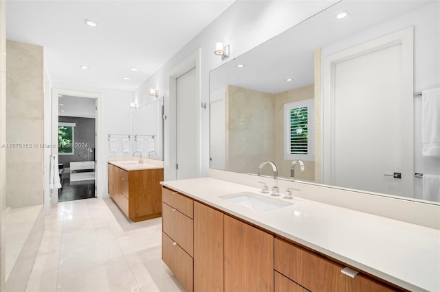 bathroom with vanity and tile floors