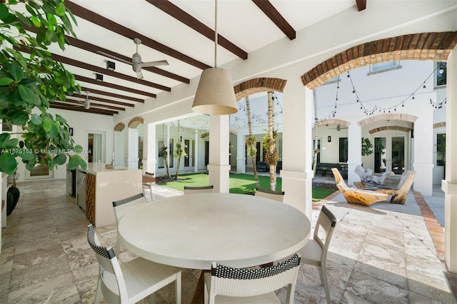 view of patio / terrace featuring french doors and ceiling fan