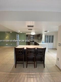 view of tiled dining area