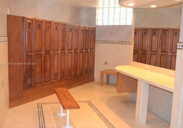 bathroom with tile flooring