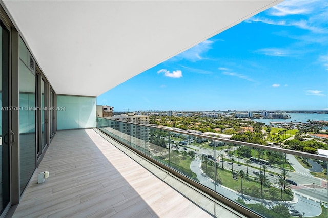 balcony featuring a water view