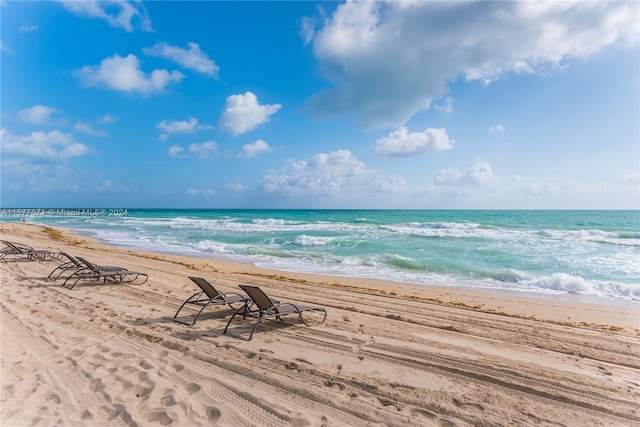 property view of water featuring a view of the beach