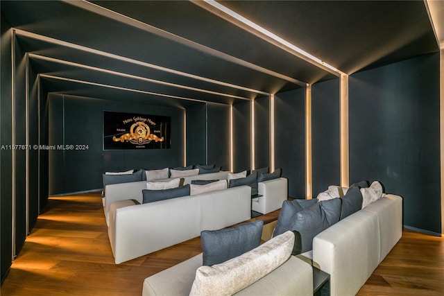 home theater room featuring hardwood / wood-style flooring