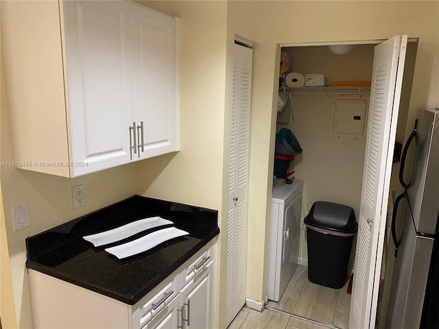 laundry room with washer / dryer