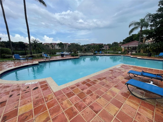 view of swimming pool featuring a patio