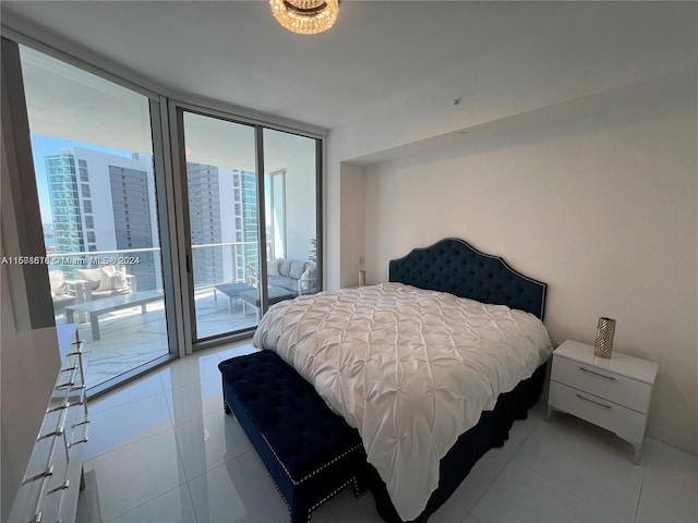 tiled bedroom with access to outside and floor to ceiling windows