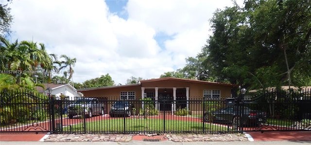 view of front of home with a front lawn