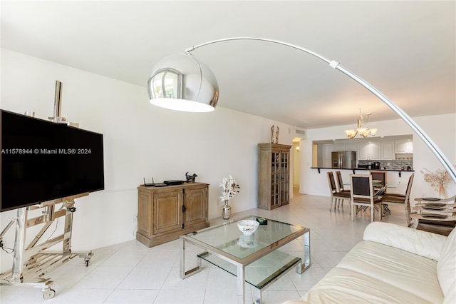 living room with a notable chandelier