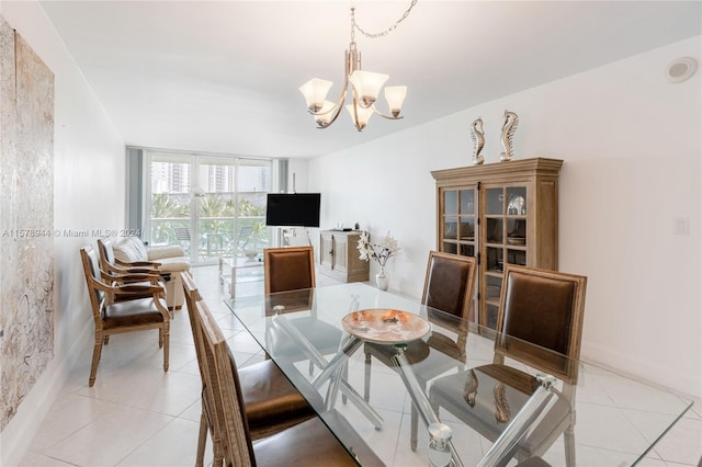 dining space with a notable chandelier, floor to ceiling windows, and light tile patterned flooring